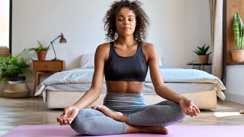 Happy, energized woman enjoying wellness and balanced lifestyle.